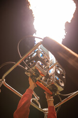 close up of hot air balloon show burner flame glowing at a night