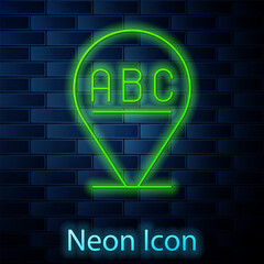 Glowing neon line Alphabet icon isolated on brick wall background. Vector