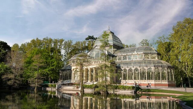 Madrid Spain time lapse 4K, city skyline timelapse at El Retiro Park Glass Palace