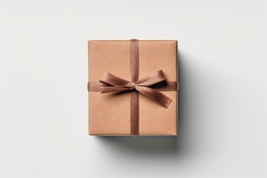 Square gift box with a bow on a white background