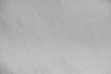 Fototapeta na wymiar Monochrome black and white (light gray) Fabric, Cloth for abstract background and texture. beautiful patterns, space for work, banner, wallpaper selective focus.