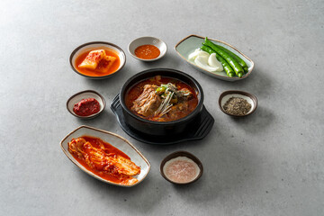 Korean food dish Side dishes, pork rib hangover soup, gopchang hot pot, and gamjatang