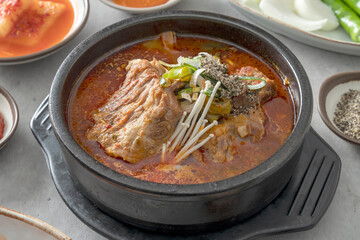 Korean food dish Side dishes, pork rib hangover soup, gopchang hot pot, and gamjatang