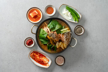 Korean food dish Side dishes, pork rib hangover soup, gopchang hot pot, and gamjatang