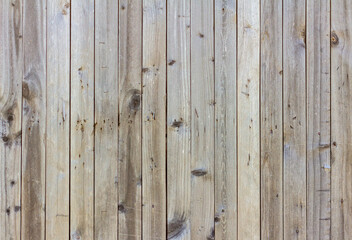 Natural wooden background.An old wooden wall darkened with age.