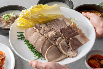 Korean food dish Beef head gukbap, boiled pork, beef, yukgyejang, side dishes