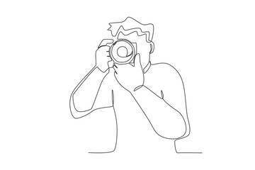 A man holding a camera. World photography day one-line drawing