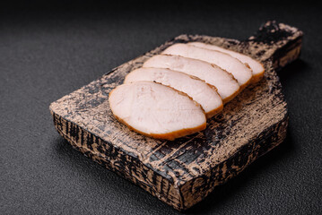 Delicious juicy grilled chicken fillet with salt, spices and herbs
