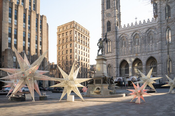 Old Montreal, Place d'Armes with Notre Dame Basilica in the background with Christmas decorations. - 640759041