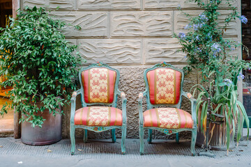 Montalcino, Tuscany: two armchairs along the street in the historic centre
