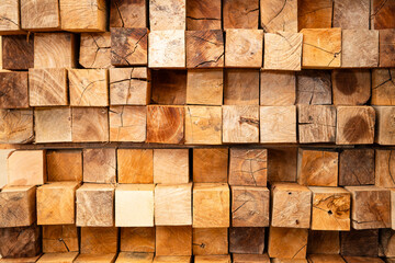 Wooden stacked in a warehouse, close-up. Wooden industrial background
