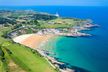 Aerial view above the coast of Santander Spain's beaches and Golf course during summer