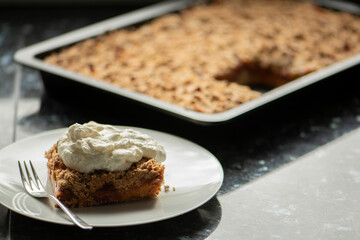 Gluten and sugar-free plum cake with crumble,with cream