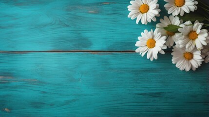 A bouquet of daisies on a blue wooden table