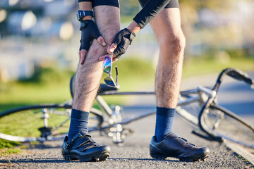 Man, cyclist and legs in knee injury, accident or pain after cycling exercise, fitness or outdoor workout on road. Closeup of male person or biker with sore bruise, inflammation or bicycle fall