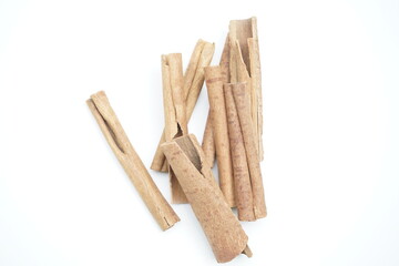 Cinnamon sticks on white background , top view