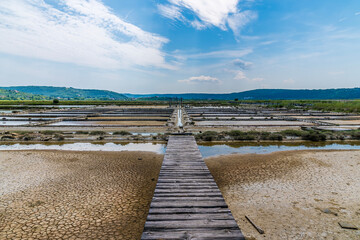 A view over empty crystallisation pools at the salt pans at Secovlje, near to Piran, Slovenia in...