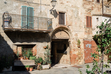 Asciano, Tuscany - Facade of an old medieval house - 640784652