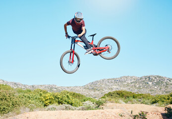 Freedom, air and man cycling in nature training for a sports competition on trail or path on...