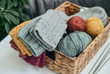 Fototapeta na wymiar Hand-knitted woolen socks of different colors
