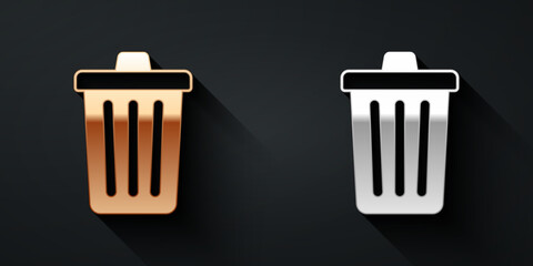 Gold and silver Trash can icon isolated on black background. Garbage bin sign. Recycle basket icon. Office trash icon. Long shadow style. Vector