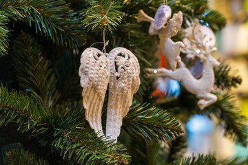 Angel wings, Christmas and New Year decorations. Background with selective focus