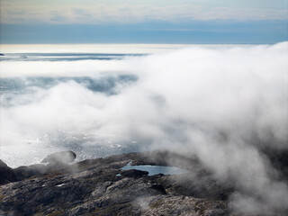 foggy mountains in greenland