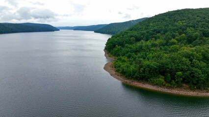 Allegheny river flows through green mountains in landscape nature area in National Forest in America wilderness