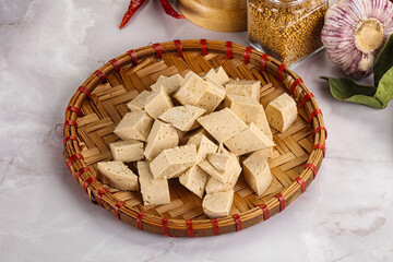 Fototapeta na wymiar Vegan cuisine - organic tofu cheese