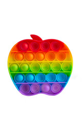 Rainbow push pop it bubble sensory fidget toy in form of Apple, trendy antistress sensory toy. Anti anxiety and stress game Isolated on white background.