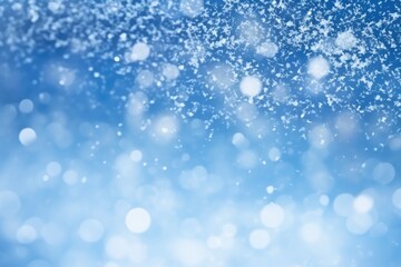 Obraz premium Abstract snow bokeh texture on blue background
