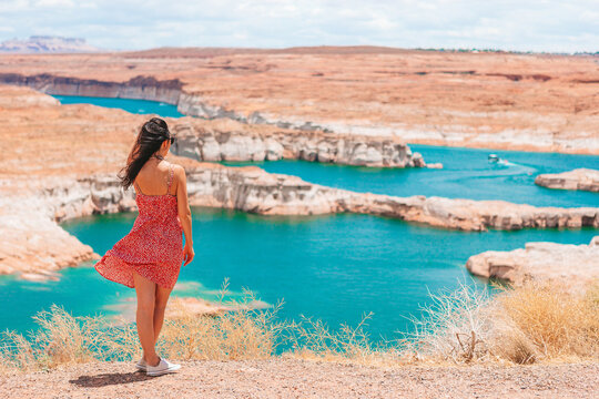Young woman enjoying the view Lake Powell, Glen Canyon National Recreation Area