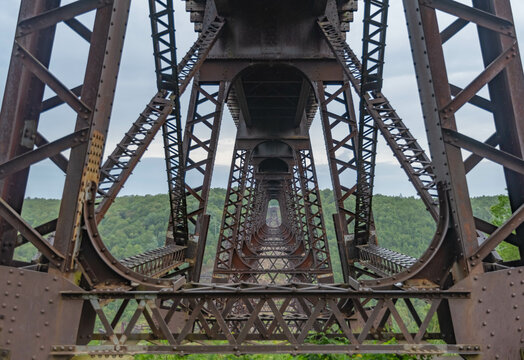 Kinzua state park bridge twisted metal after the hurricane, copy space Pennsylvania landmark attraction, natural light, early autumn season, overcast day.