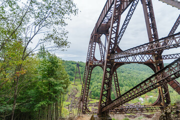 Kinzua bridge state forest park season, copy space, backgrounds, travel destination, green forest early fall weather.