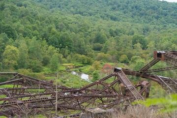 Kinzua state park bridge twisted metal after the hurricane, copy space Pennsylvania landmark attraction, natural light, early autumn season, overcast day.