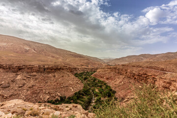 Landscape impression of the semidesert along the atlas torrent in morocco in summer