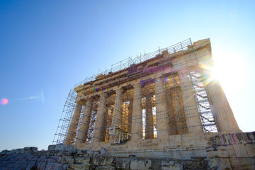 Restored Parthenon main landmark in Acropolis, Athens, Greece on a blue summer sky