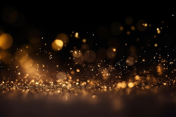 Abstract gold shiny Christmas background with bokeh. Holiday bright golden dust. Blurred backdrop with particles. - obrazy, fototapety, plakaty