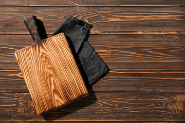 New cutting board on wooden background