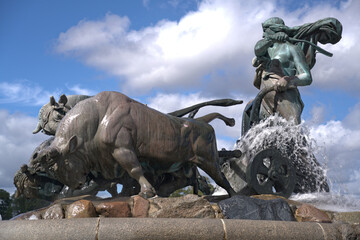 Gefion Fountain famous landmark in Copenhagen, Norse goddess Gefjon on a plow pulled by oxen, in Nordre Toldbod Copenhagen
