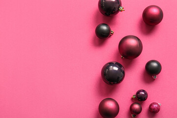 Christmas balls on pink background