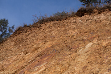 photograph of flagstone on a hill. Concept of nature and industries.