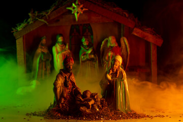 Traditional Christmas scene birth of Jesus. Nativity scene with figures. Christmas scene of born...