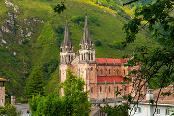 Fototapeta na wymiar Impressive Catholic Basilica de Santa Maria La Real in small mountain Spanish village of Covadonga, Asturias..