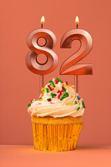 Birthday cake with candle number 82 - Coral fusion background