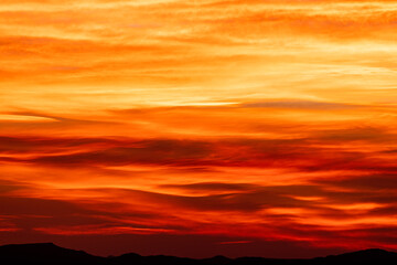 Obraz premium Smear Of Evening Clouds Look Like a River of Fire Over Big Bend