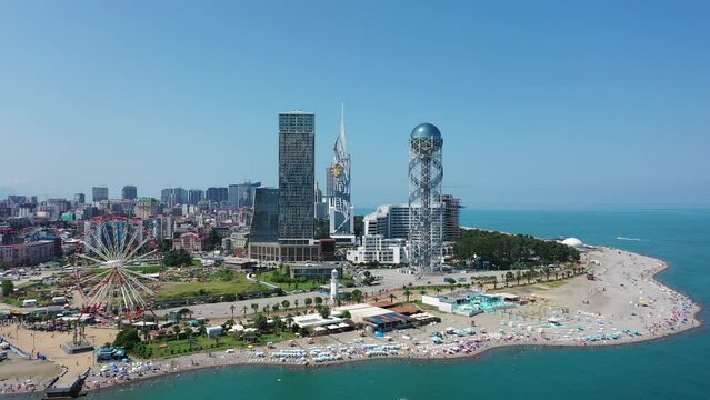 Fantastic aerial view of Batumi beach packed with tourists during summer. Batumi, Country of Georgia