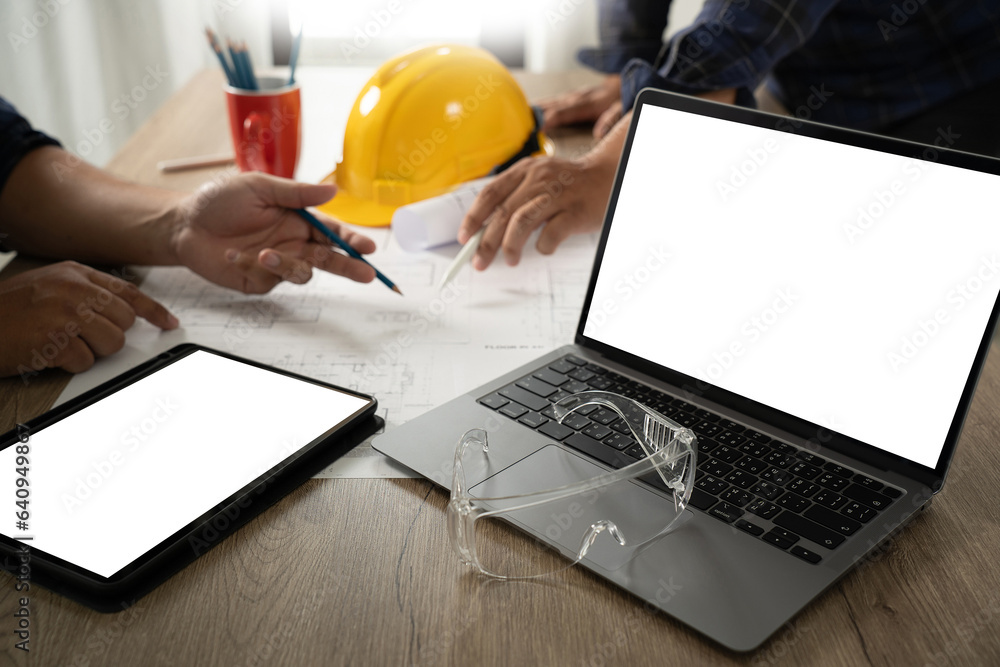 Aufkleber engineer a construction technology worker checks an engineer using a computer on a construction site
