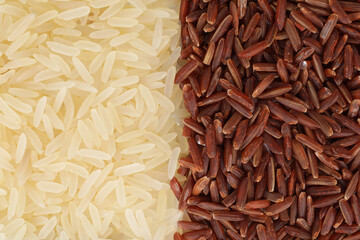 Raw white and red rice as background, top view