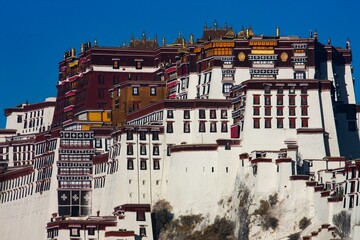 Capture the stunning architectural beauty of the Potala Palace complex in Lhasa, Tibet, with this...